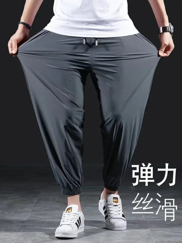 Summer Quick-drying Ice Silk Casual Pants Men's Ultra-thin Elastic Nine-point Pants Loose Drape Solid  Beam Feet Pants 7XL