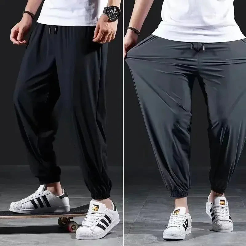 Summer Quick-drying Ice Silk Casual Pants Men's Ultra-thin Elastic Nine-point Pants Loose Drape Solid  Beam Feet Pants 7XL