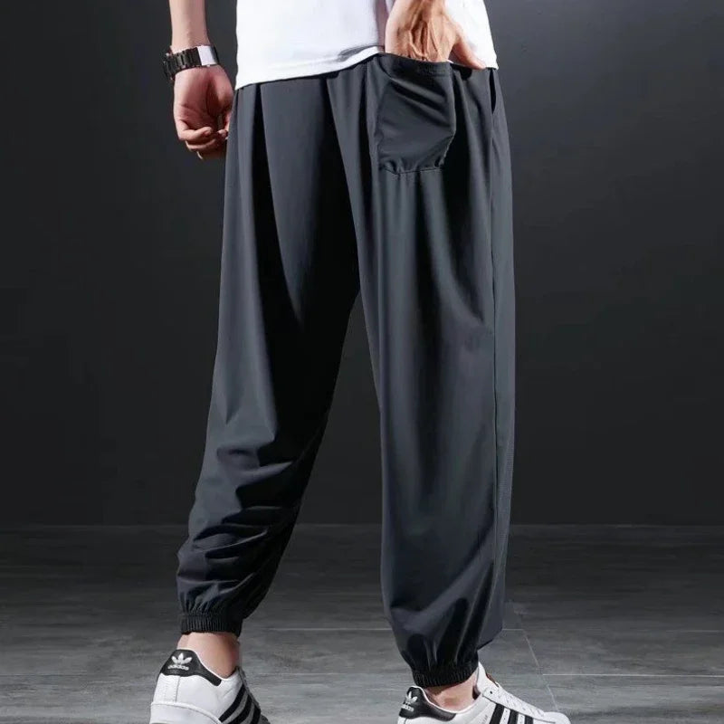 Summer Quick-drying Ice Silk Casual Pants Men's Ultra-thin Elastic Nine-point Pants Loose Drape Solid  Beam Feet Pants 7XL